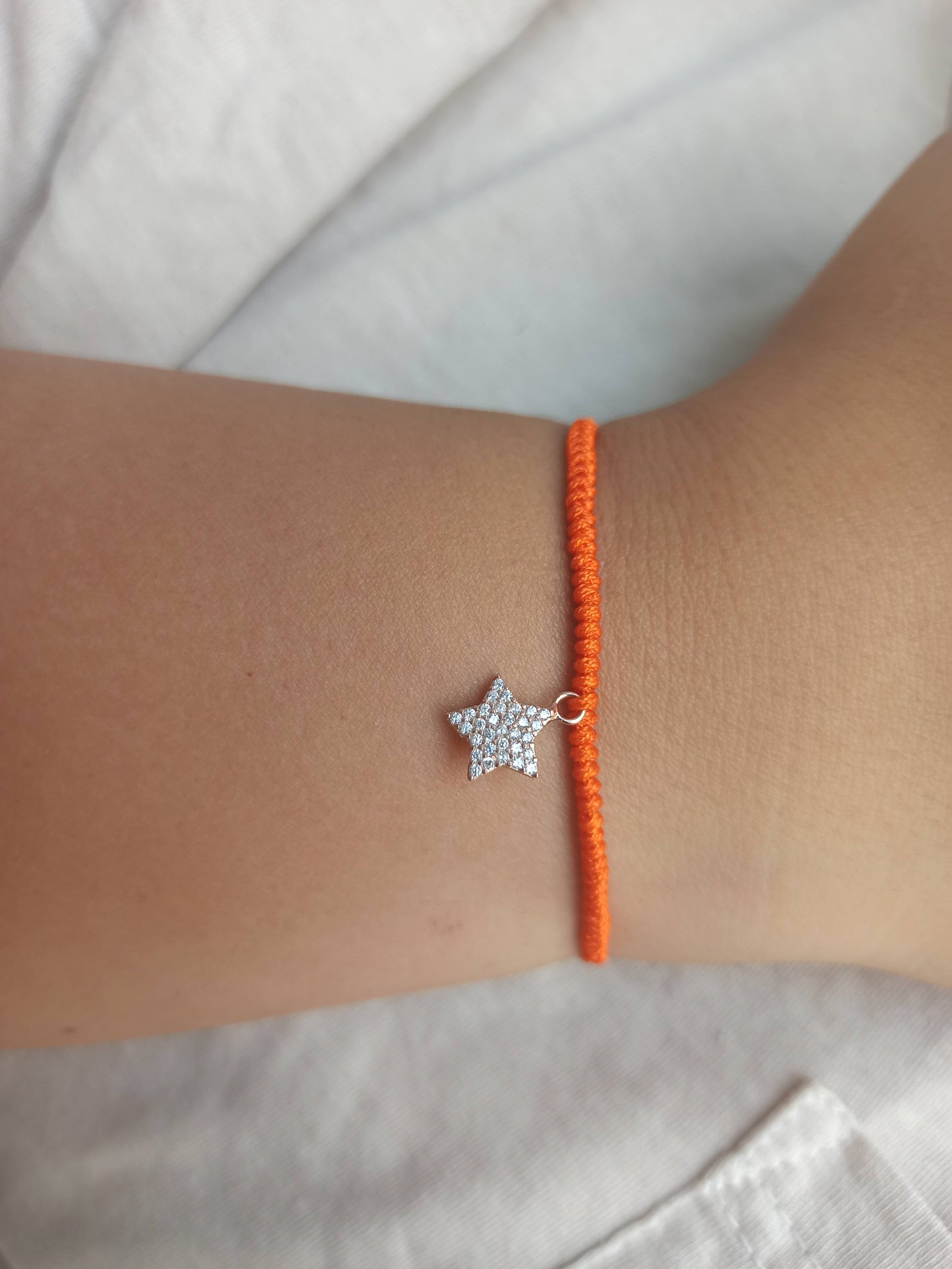 Taşlı gümüş yıldız  turuncu ipli bileklik